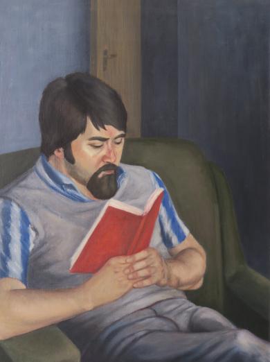 Wolfgang im Sessel mit Buch